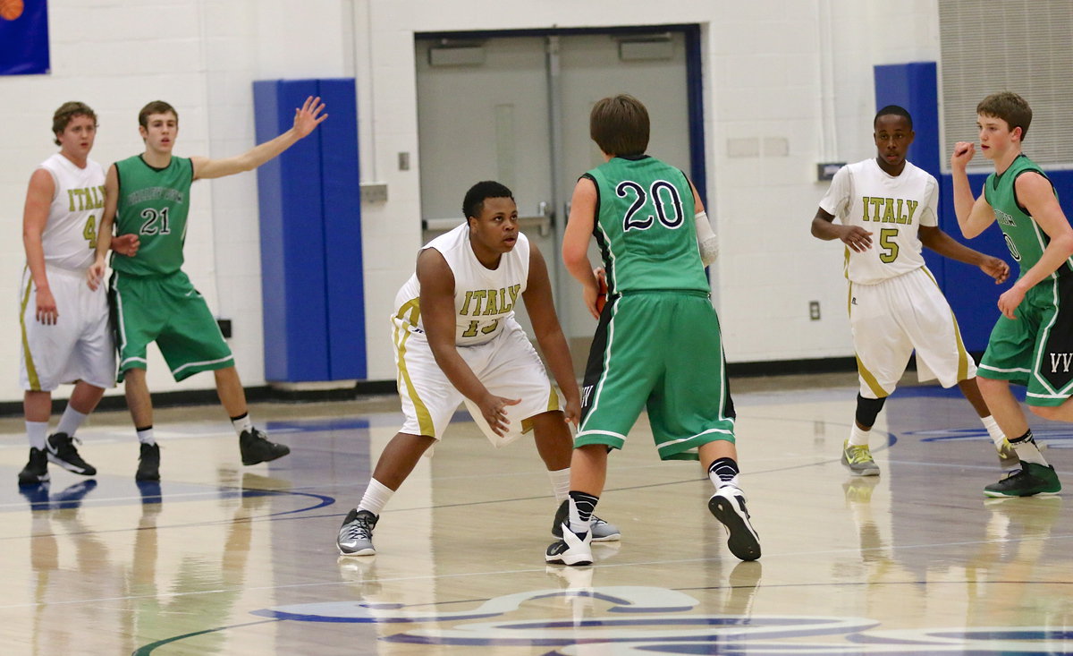 Image: Gladiators Bailey Walton(4), Darol Mayberry(13) and Kevin Johnson(5) guard their opponents thoroughly.