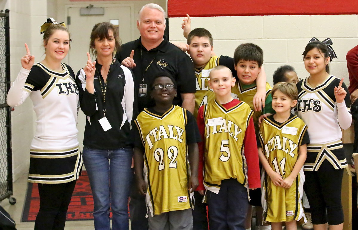 Image: Team Italy (L-R): Taylor Turner, CBI teacher Teresa Young, Stafford Elementary Principal Jonathan Nash, Damarcus Houston(22), Wyatt Ballard(24), Charlie Bolin(5), Mikey South(40), Frank South(14) and Jessica Garcia.