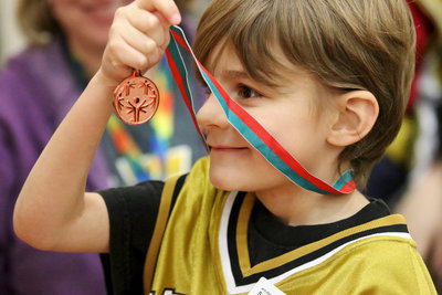Image: Frank South(14) admires his 3rd place medal. Way to go, Rookie!