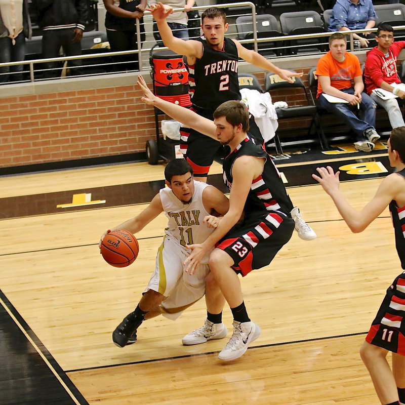 Image: Senior Gladiator Tyler Anderson(11) drives the base line against Trenton.