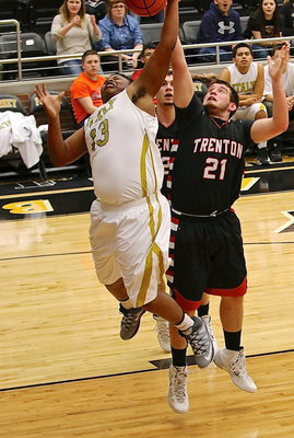 Image: Darol Mayberry(13) skies to take this rebound away from Trenton.