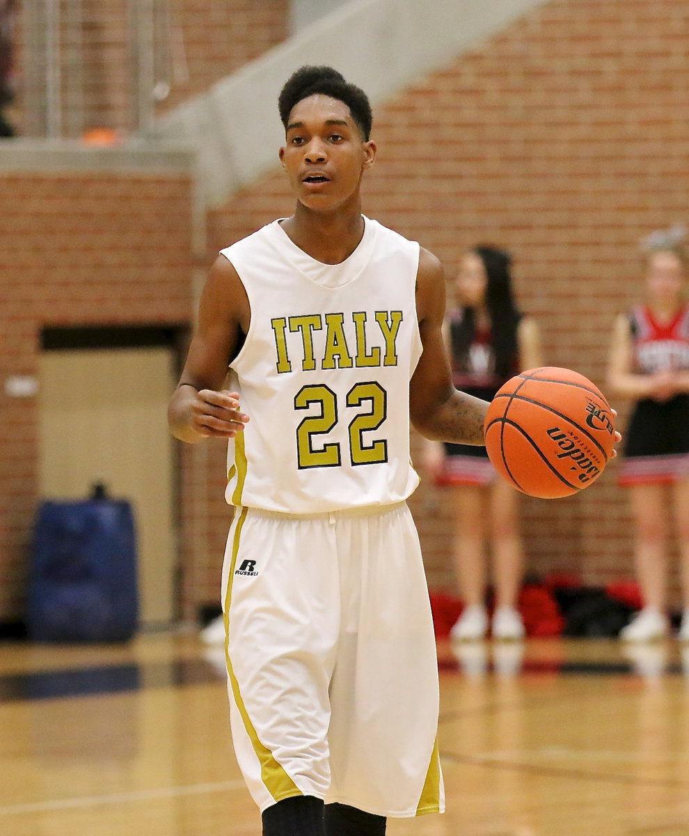 Image: Senior Trevon Robertson(22) brings the ball up for the Gladiator offense.