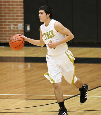Image: Sophomore Mason Womack(1) dribbles the ball up the floor for the Gladiator offense.