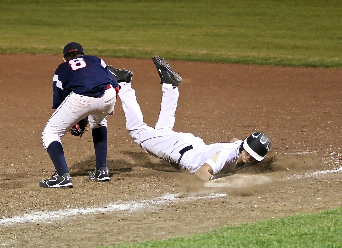 Image: JV Gladiator Mason Womack(1) beats the throw back to the first base bag but Italy falls to Red Oak Life 16-7.