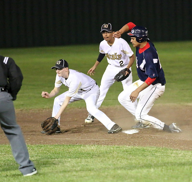 Image: Jorge Galvan(2) backs up teammate Hunter Ballard(1) while Ballard makes an attempt to stop a Red Oak Life base runner.