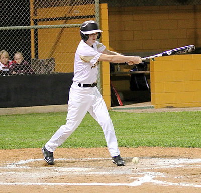 Image: Hunter Ballard(1) hits an RBI single that zips past the Red Oak Life defense and into right field.