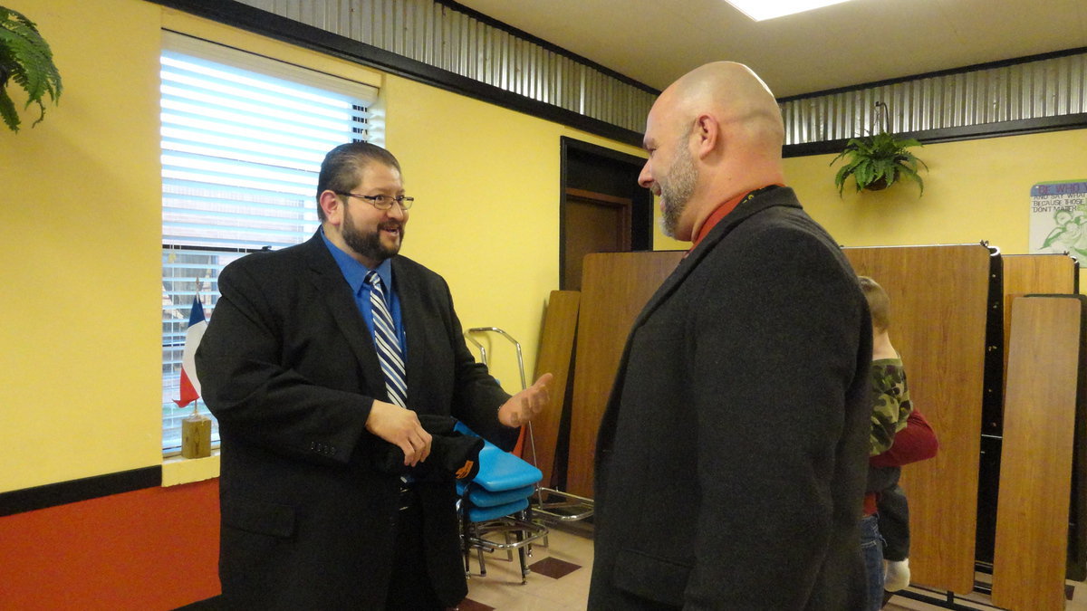 Image: Jaime Valesco and Lee Joffre, high school principal, prepare for the remainder of the school year.