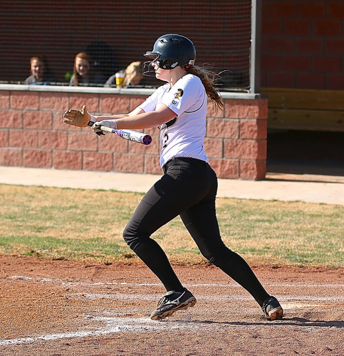 Image: Madison Washington(2) drives the ball into centerfield for a 3 run, inside-the-park homer.