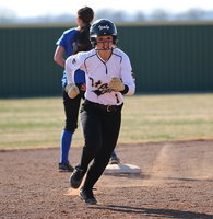 Image: After another Lady Gladiator hit, Bailey Eubank(1) leaves second-base in the dust.