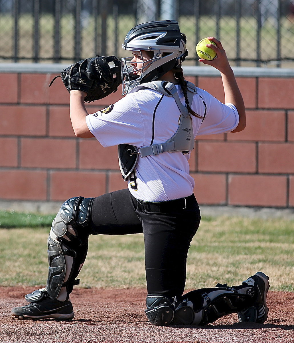 Image: Lady Gladiator catcher Lillie Perry(9) carries her glove like a shield and throws the ball as if she were wielding a sword.