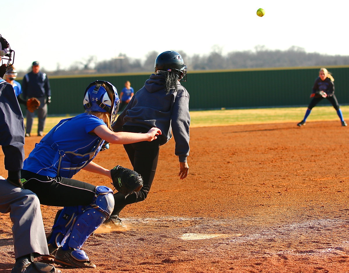 Image: Italy’s K’Breona Davis drives the ball toward Leon’s shortstop.