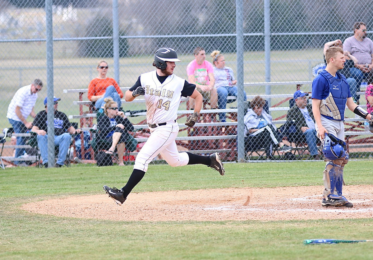 Image: Kyle Fortenberry(14) sprints across the plate for an Italy run against Rice.