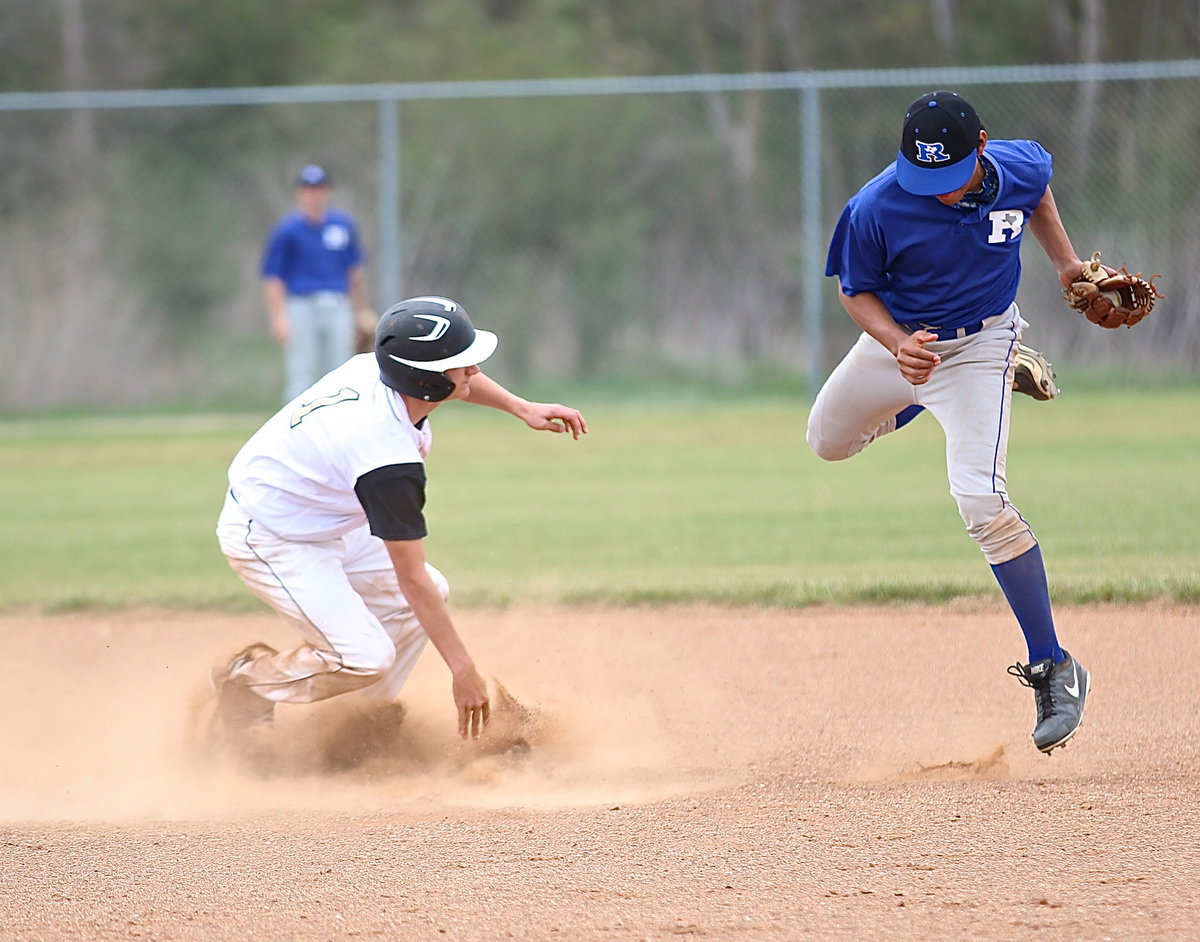 Image: Levi McBride(1) steals second-base against Rice.