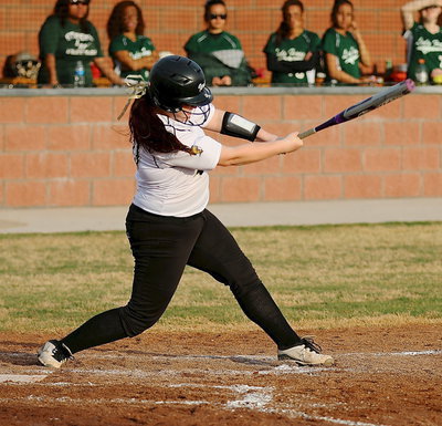 Image: Paige Westbrook(10) drives a pitch into the heart of the Lake Worth defense.
