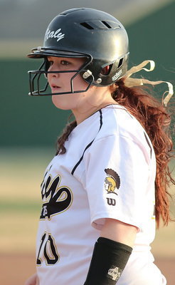 Image: Lone Lady Gladiator senior Paige Westbrook(10) is feeling pretty good after hitting a single against Lake Worth.