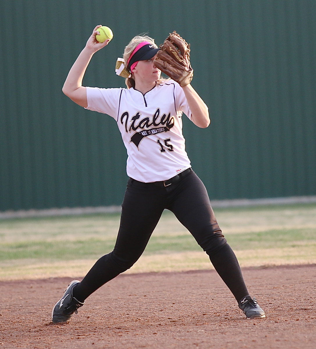 Image: Shortstop Jaclynn Lewis(15) throws out a Lake Worth runner at first-base.