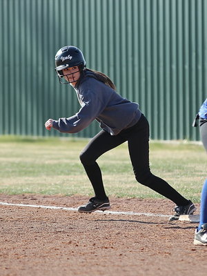 Image: Lady Gladiator Cassidy Childers(3) is ready to steal second-base.