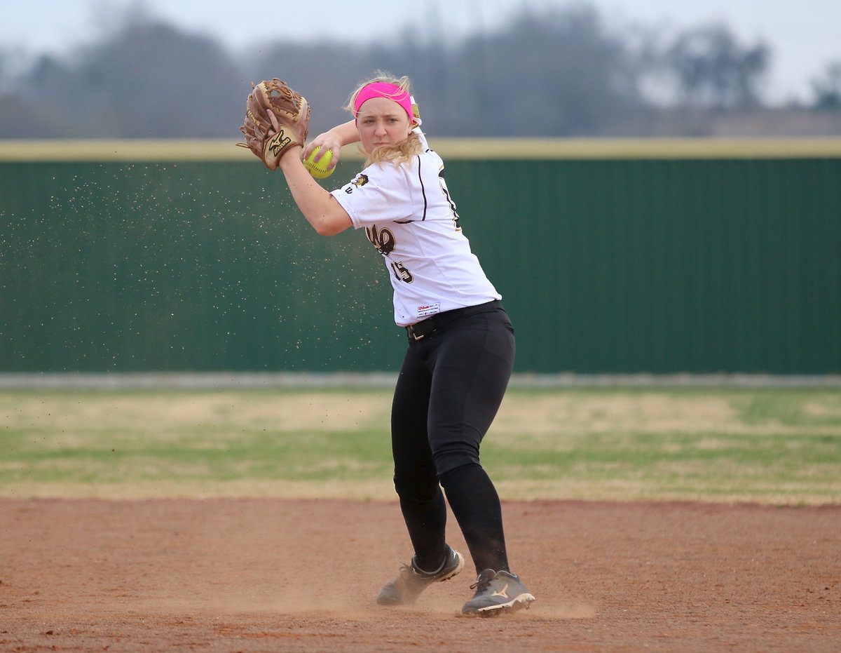 Image: Jaclynn Lewis(15) gets the job done at shortstop against Lake Worth.