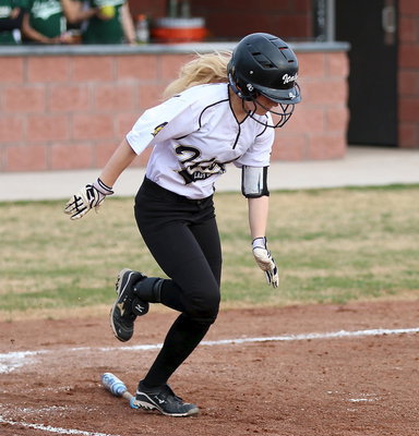 Image: Britney Chambers(4) hits a single against Lake Worth.
