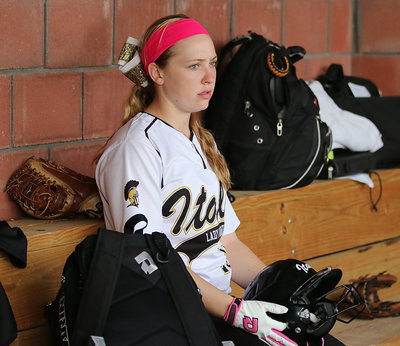 Image: Jaclynn Lewis(15) is intense even in the dugout.