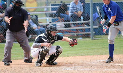 Image: Catcher Tyler Vencill pulls in a strike against Rice.