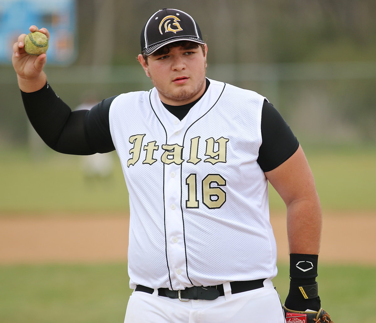 Image: First-baseman Kevin Roldan(16) is ready to finish off Rice.