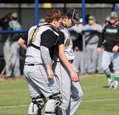 Image: Tyler Vencill(15) discusses the signs with pitcher Ryan Connor(4).