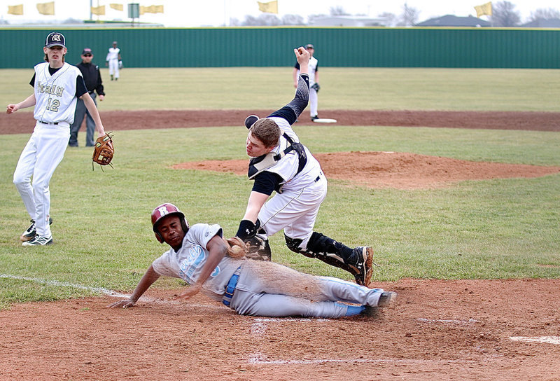 Image: Junior catcher John Escamilla makes the tag for an out against Roosevelt to help the Gladiators win round-one, 8-2, of their team’s hosted baseball tournament at Davidson Field in Italy.