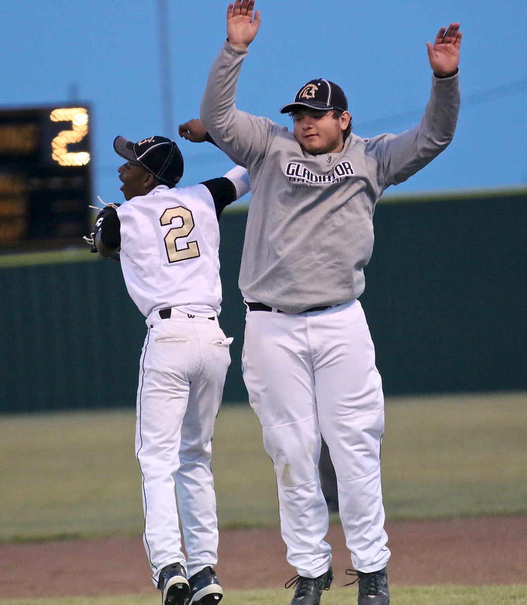 Image: Eric Carson(2) and Kevin Roldan(16) celebrate their team’s tournament success.