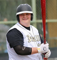 Image: Playing baseball always puts a smile on the face of John Byers(18).