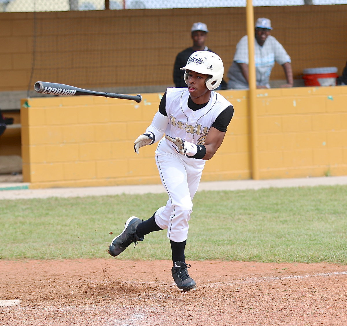 Image: Eric Carson(2) battles his way to a walk against Roosevelt.