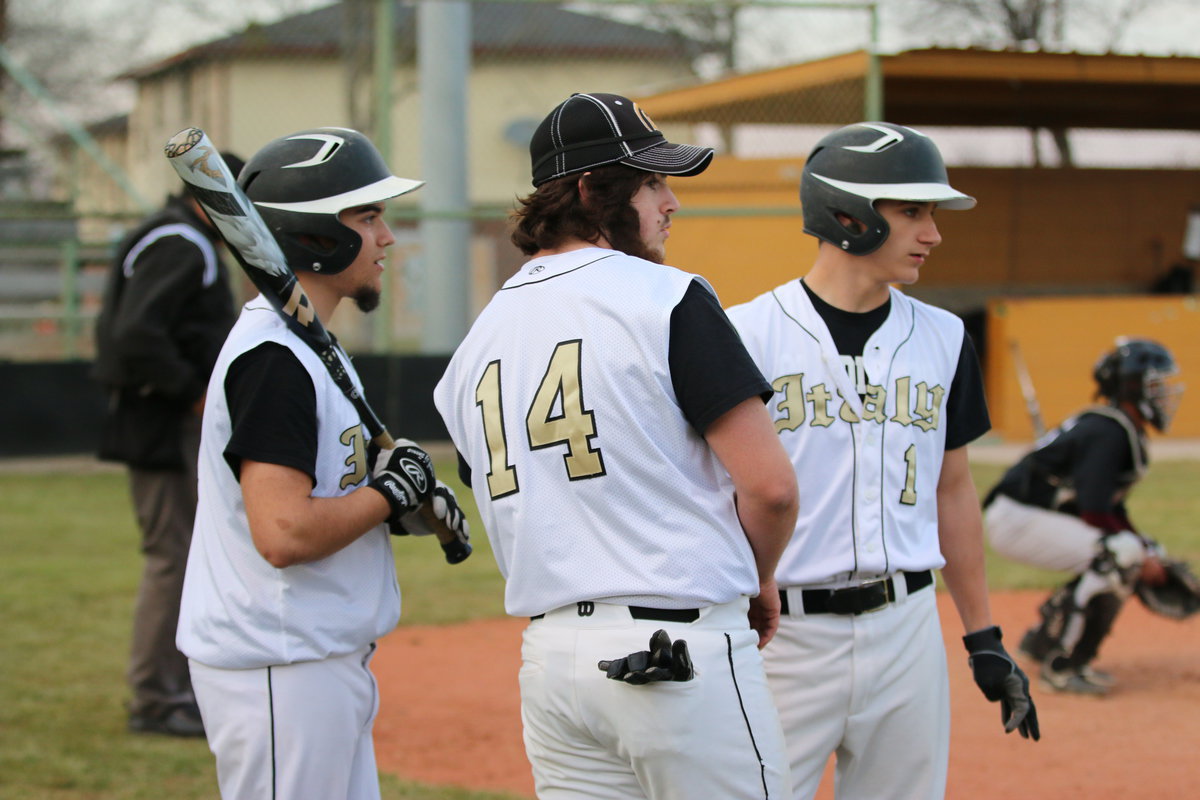 Image: Tyler Anderson(11), Kyle Fortenberry(14) and Levi McBride(1) survey the scene against Faith Family.