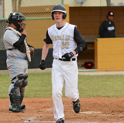 Image: Cody Boyd(10) scores a run for the Gladiators.