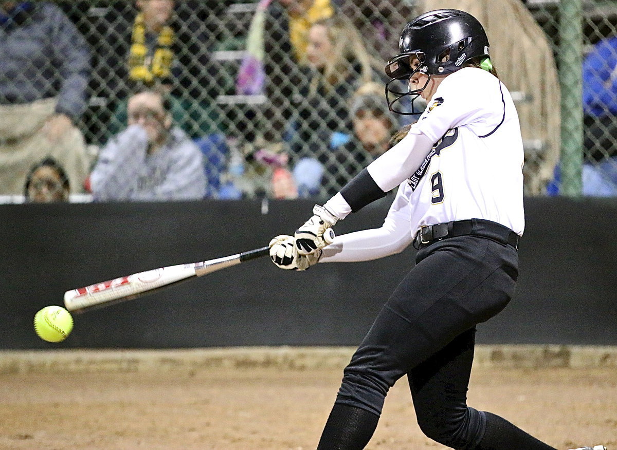 Image: Lady Gladiator Lillie Perry(9) connects on a pitch.