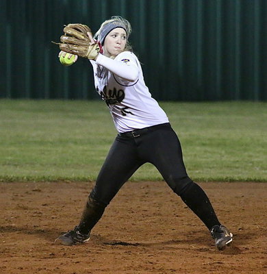Image: Shortstop Jaclynn Lewis(15) guns a Panther out at first-base.