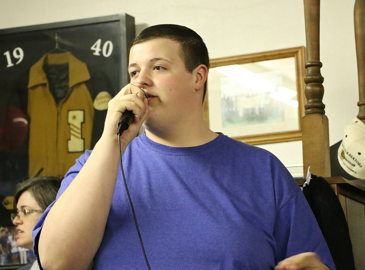 Image: Zac Mercer jumpstarts the bidding war during the dinner.