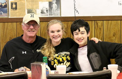 Image: Italy Athletic Director Charles Tindol enjoys the spaghetti dinner along with daughter Rebecca Tindol, visiting from Abilene, and son Cade Tindol.