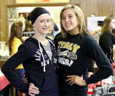 Image: Lana Beets and Hannah Haight model for photo during the spaghetti dinner.