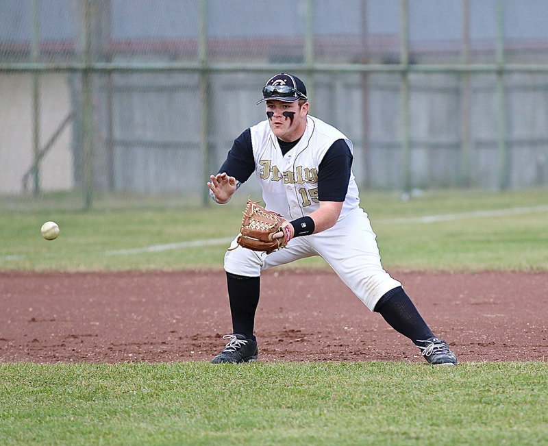 Image: Third-baseman Tyler Vencill(15) makes a play on the ball during Italy’s pre-district game against visiting Maypearl.