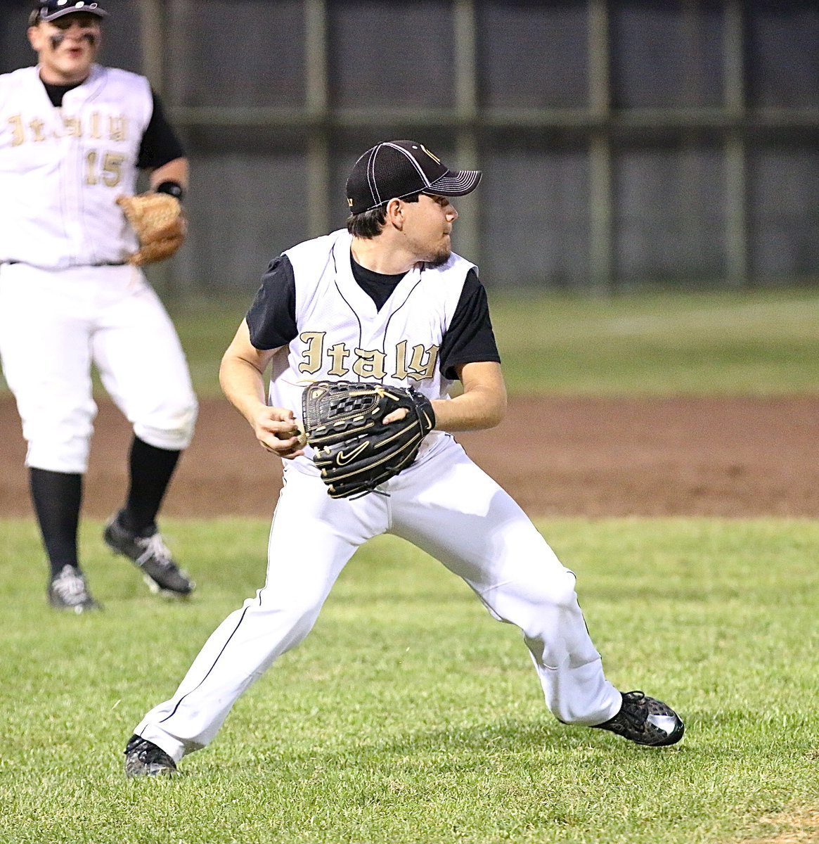 Image: Pitcher Tyler Anderson(11) covers a grounder and then looks to throw to second.