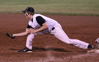 Image: Italy’s Bailey Walton makes the catch at first-base to get a Panther runner out.