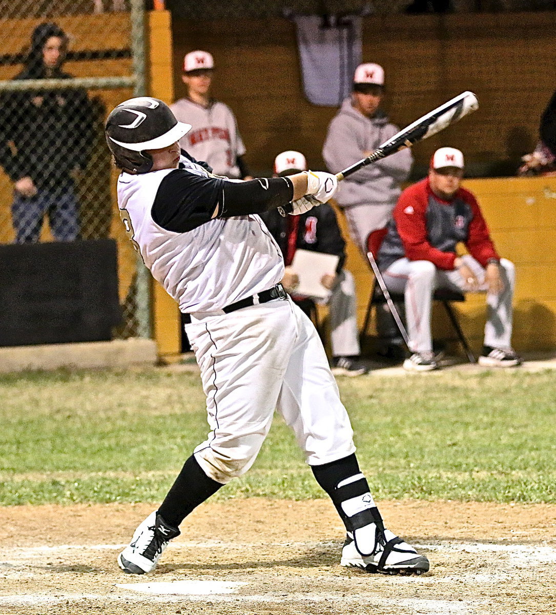 Image: John Byers(18) hits one deep into centerfield but the Panthers track it down and make the catch.