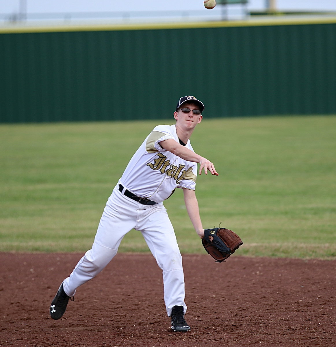 Image: JV Gladiator Hunter Ballard(1) throws to first-base.