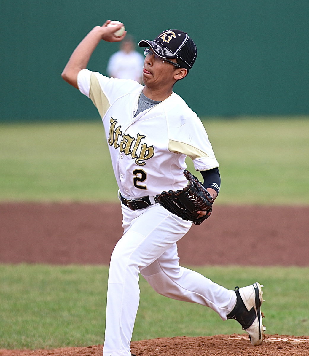 Image: JV Gladiator Jorge Galvan makes his pitching debut against Maypearl and opens with a first pitch strike.