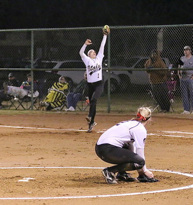 Image: First-baseman Bailey Eubank(1) stretches for a high pass after a Maypearl hit.