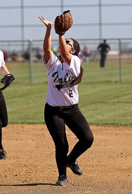 Image: Second-baseman Ashlyn Jacinto(6) catches a pop fly for the Lady Gladiators.