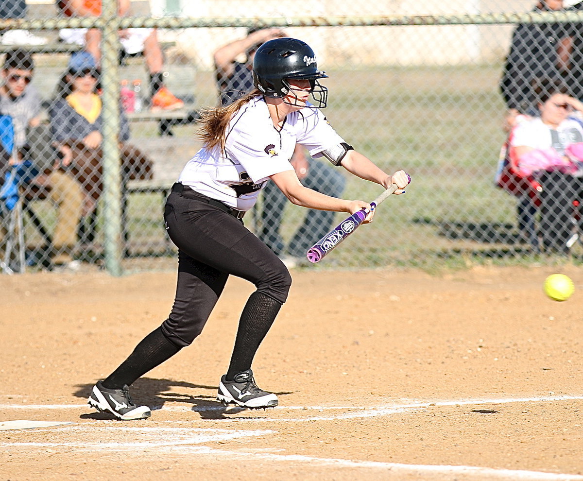 Image: Hannah Washington(8) bunts the ball into play for Italy.