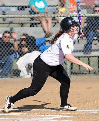 Image: Lady Gladiator Paige Westbrook(10) hits one at the Lady Wampus Cats.