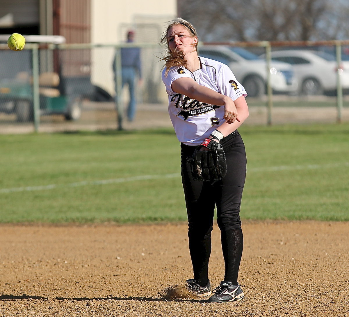 Image: Shortstop, Madison Washington(2) warms up.