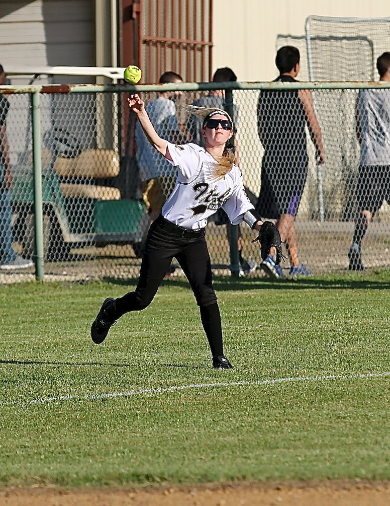 Image: Britney Chambers(4) tracks down a grounder hit into left field.